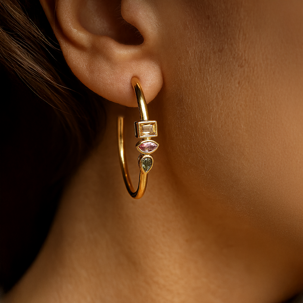 Gold hoop earring with gemstones