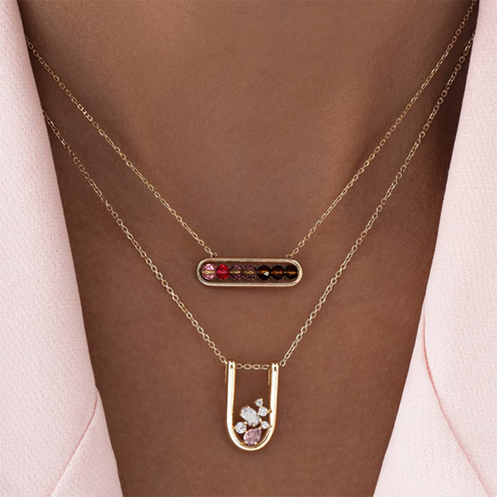 Gold necklaces with gemstone pendants