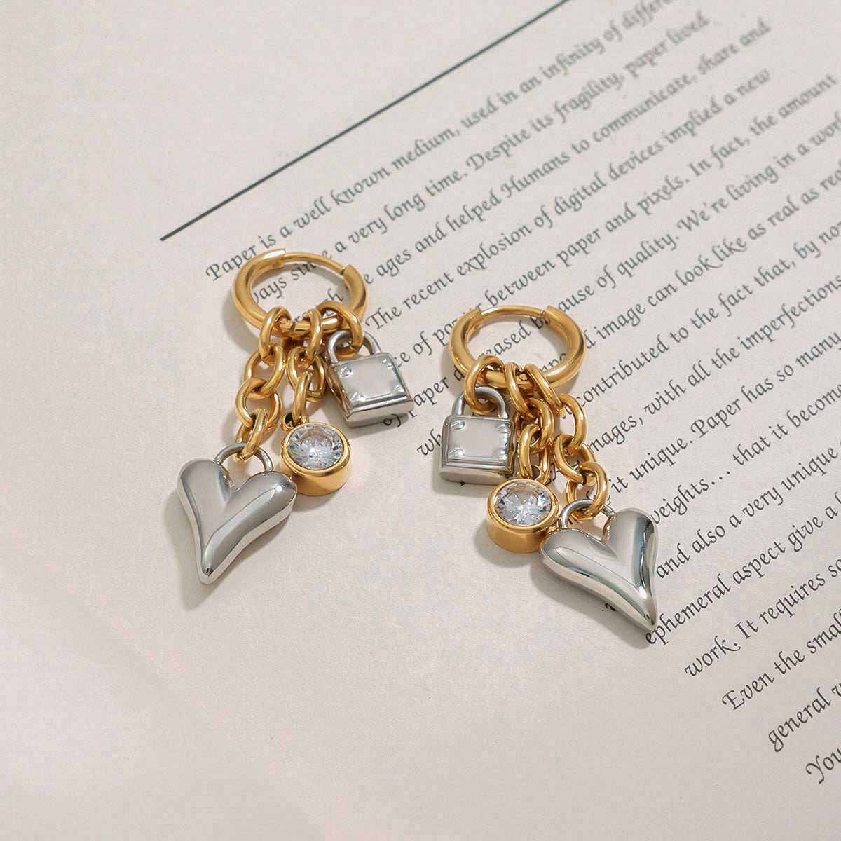 Pair of gold and silver heart-shaped  Dangler  Earrings 