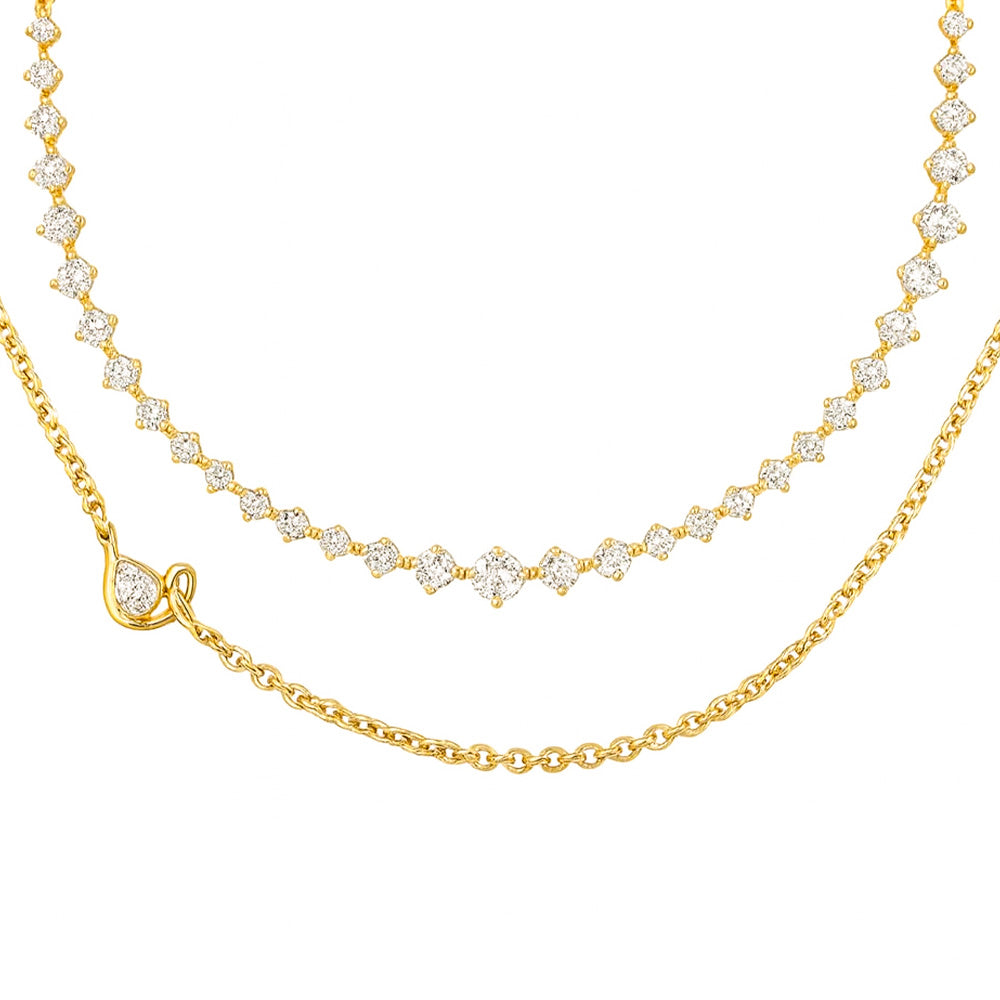 gold and diamond necklace for bridal or evening wear, shown on a dark outfit