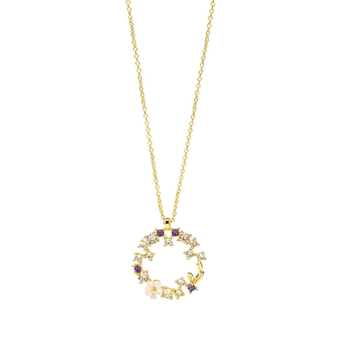 Gold necklace with a circular pendant 