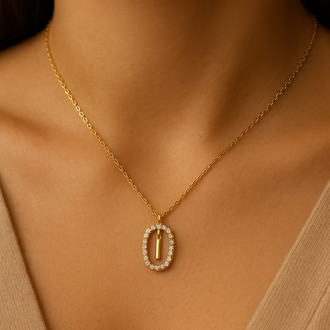 Gold necklace with a pendant Letter I
