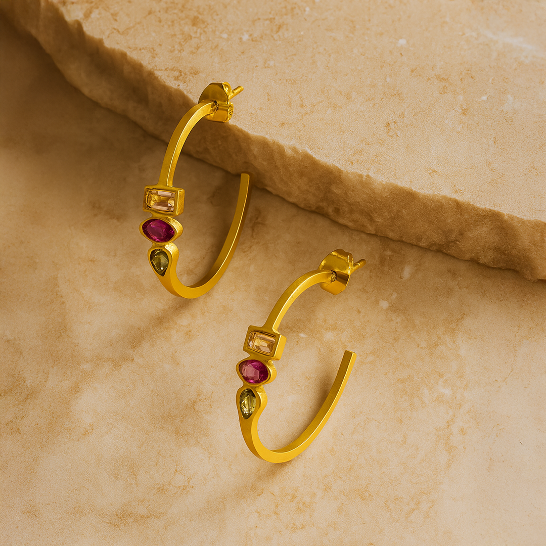 Gold hoop earrings with gemstones 