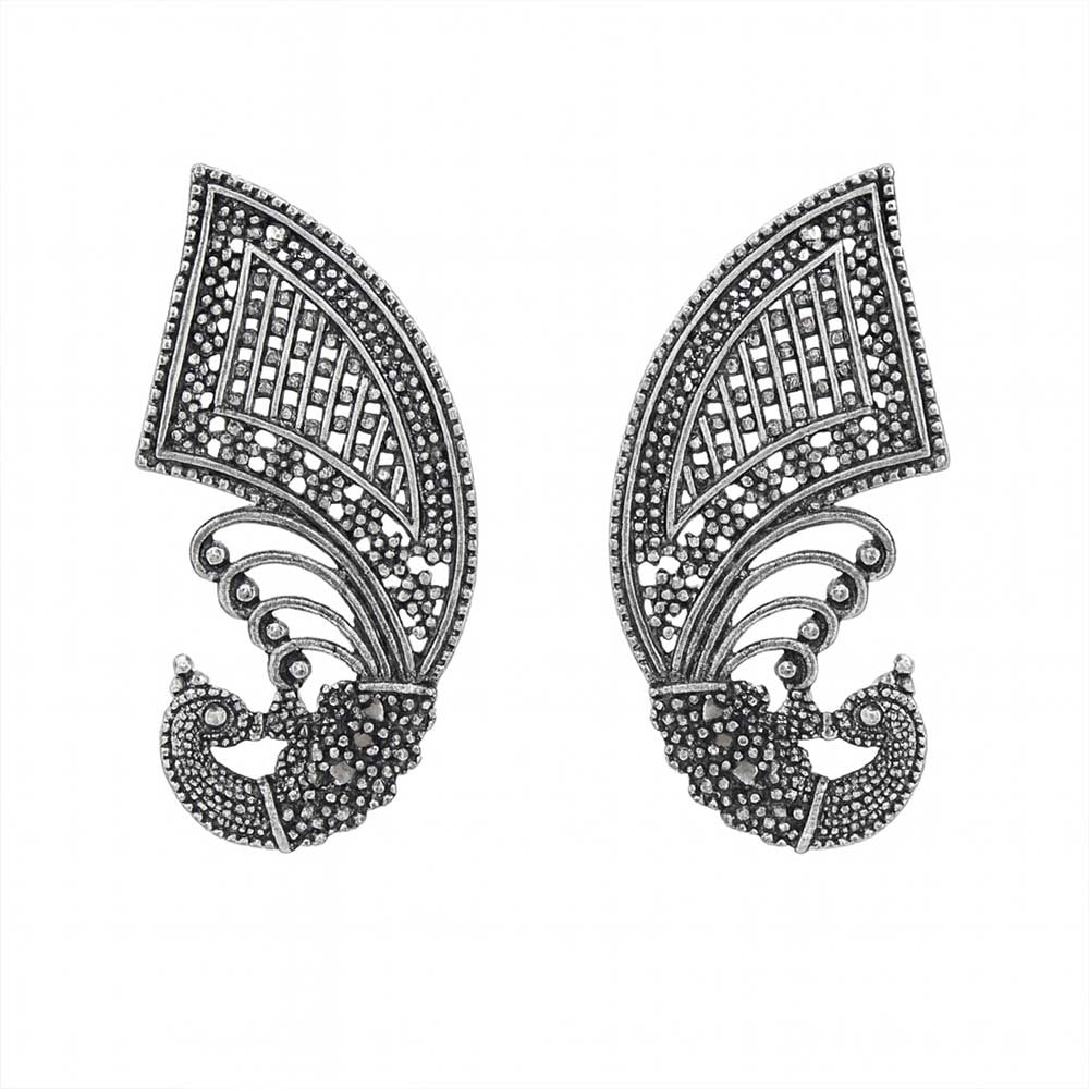 Pair of ornate silver earrings on a white background