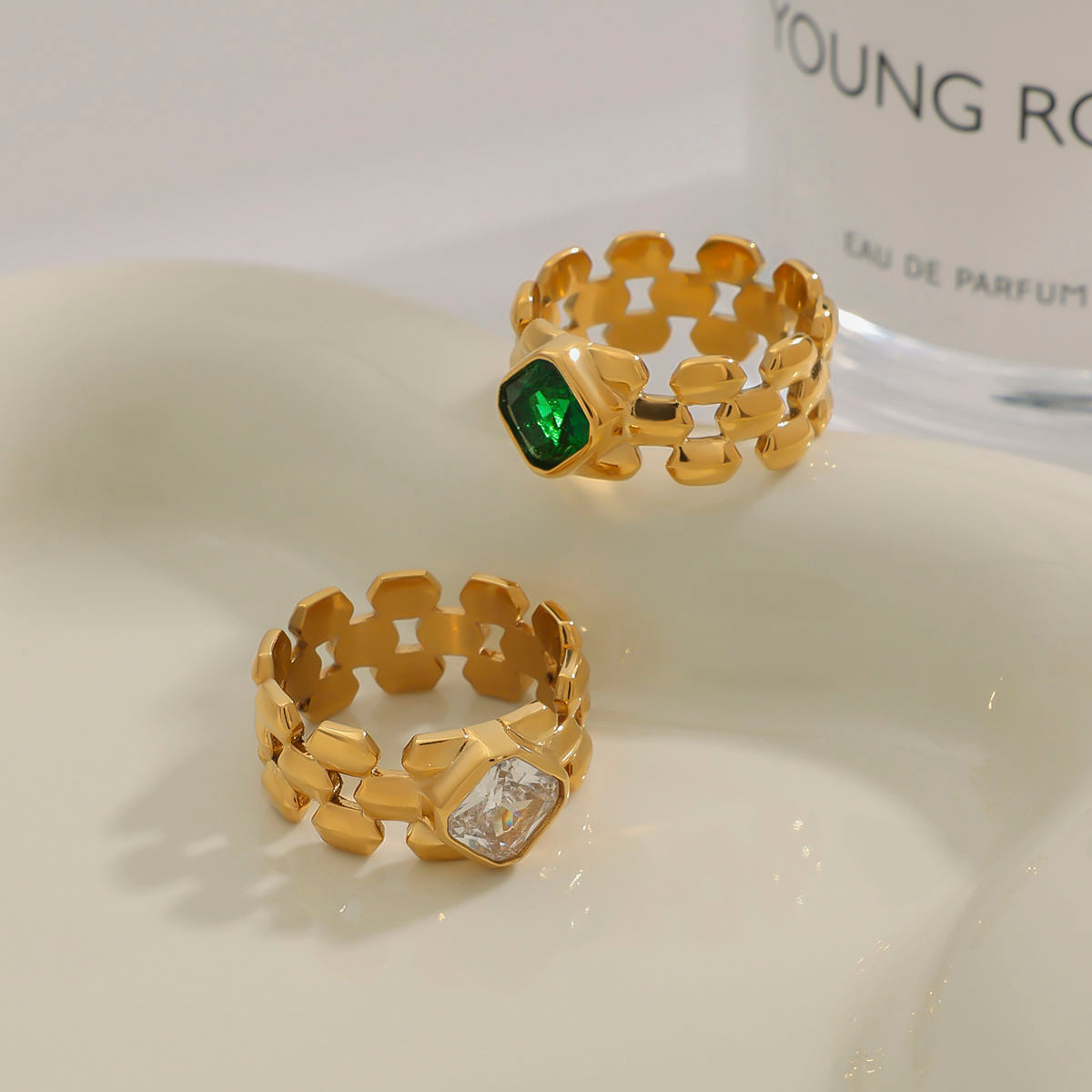 Two gold rings with gemstones 