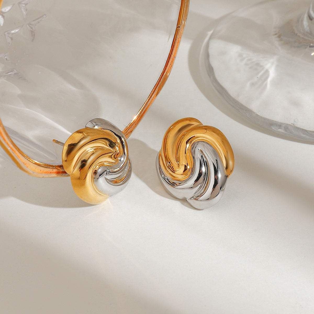 Gold and silver spiral earrings 
